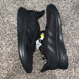 Black size 9 Men’s Duramo 9 adidas sneakers. Brand new with tags not worn!